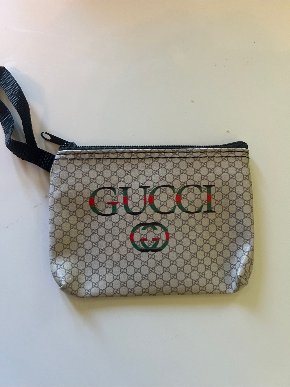 Gucci mini  Beige canvas Monogram Wristlet with Green & Red Logo